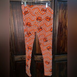 LuLaRoe Leggings‎ in Orange with Skull Pattern Halloween